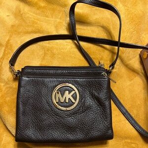 Gently used Crossbody bag by Michael Kors.